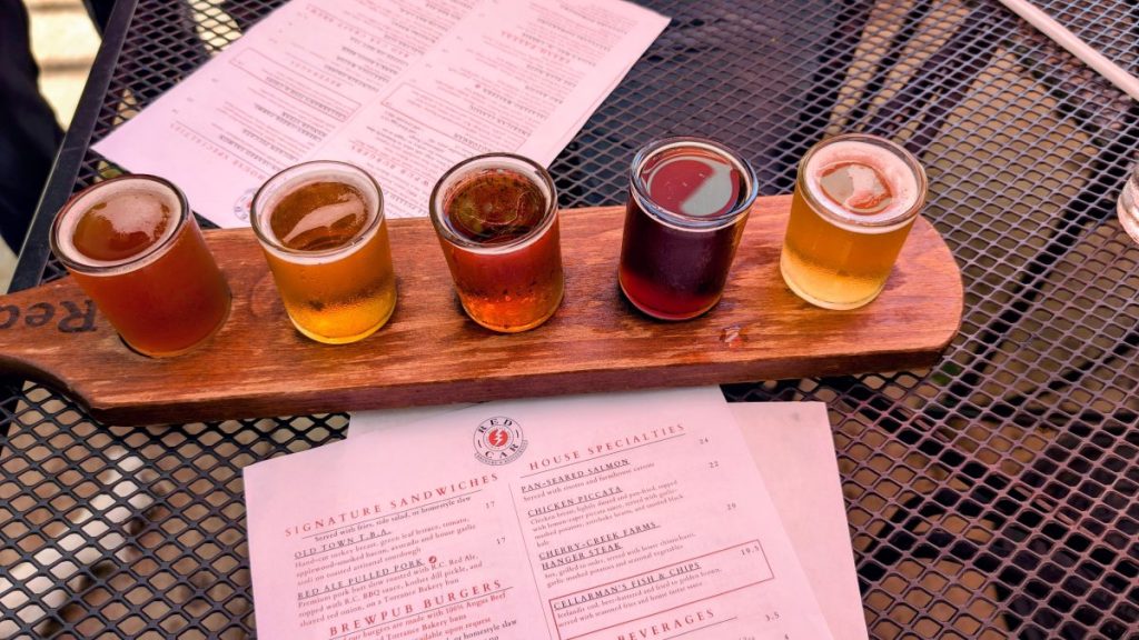 Beer flight and menus at Red Car Brewery and Restaurant