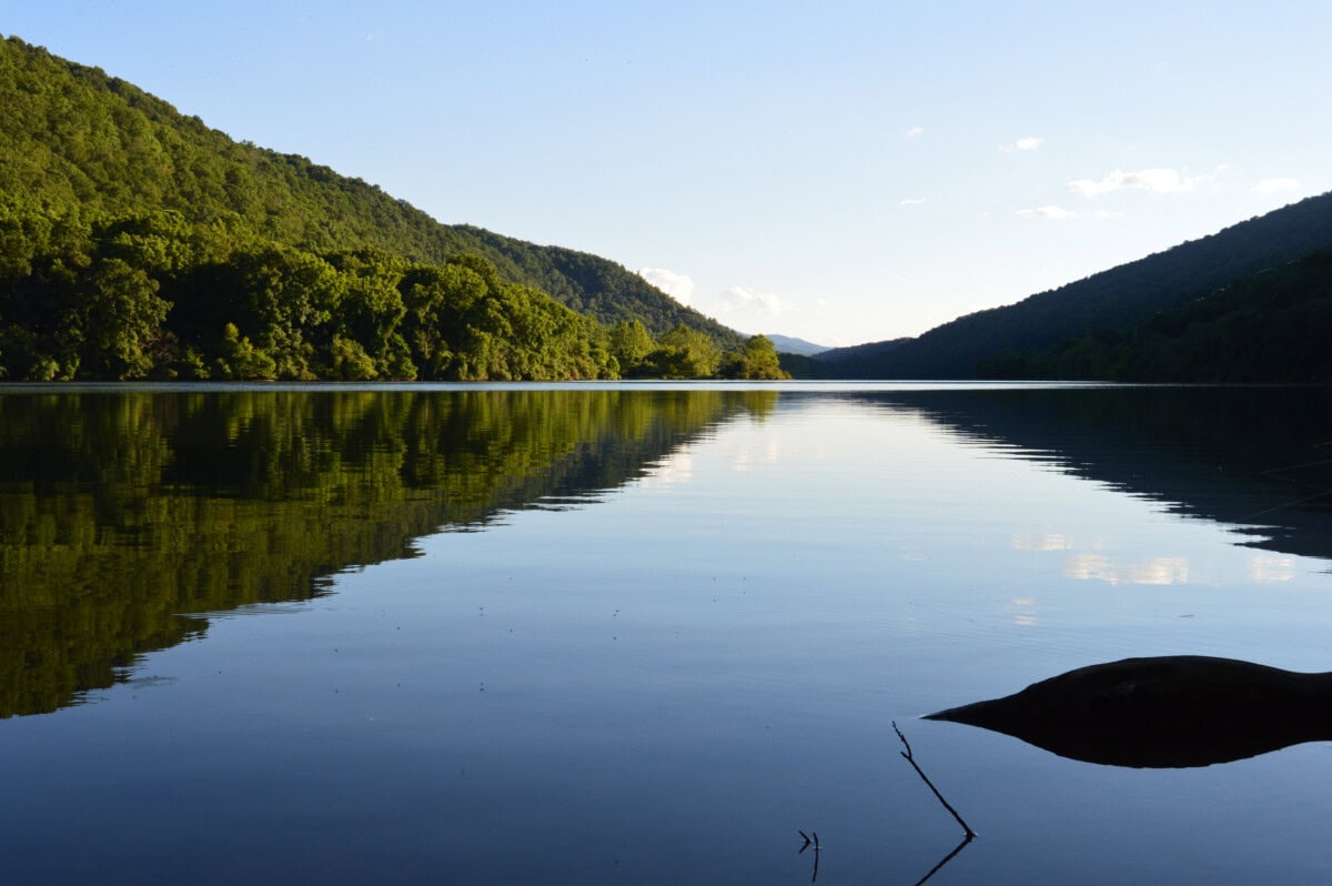 clear waters and mountains at lake moomaw va_shutterstock