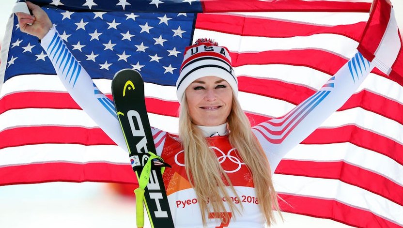 Bronze medallist Lindsey Vonn of the United States celebrates during the victory ceremony for the Ladies' Downhill on day 12 of the PyeongChang 2018 Winter Olympic Games