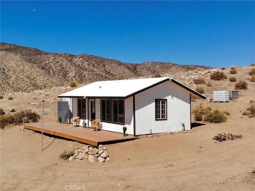 It may be rustic, but this 400-square-foot cabin is inexpensive and ideally situated on a 5 acre lot.