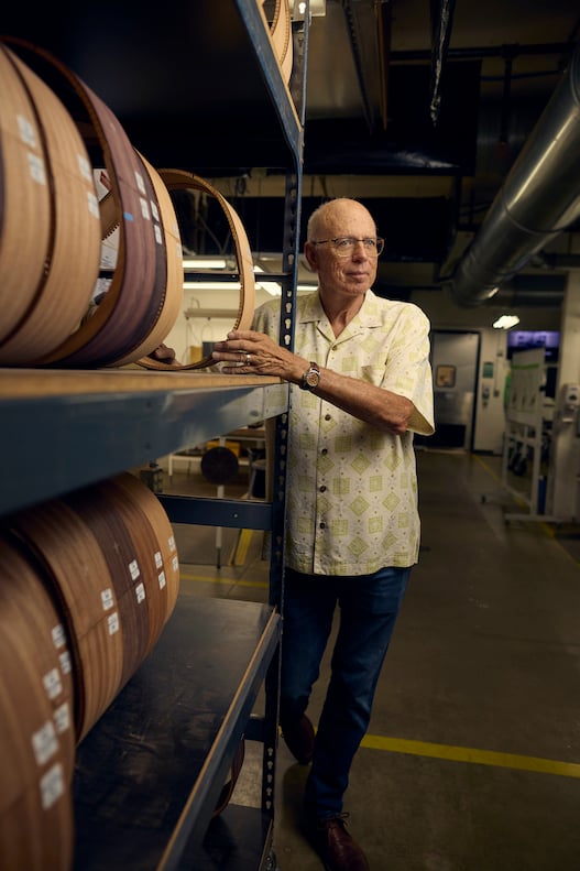 Taylor Guitars founder Bob Taylor celebrating the brand's 50 year anniversary in the El Cajon, San Diego factory