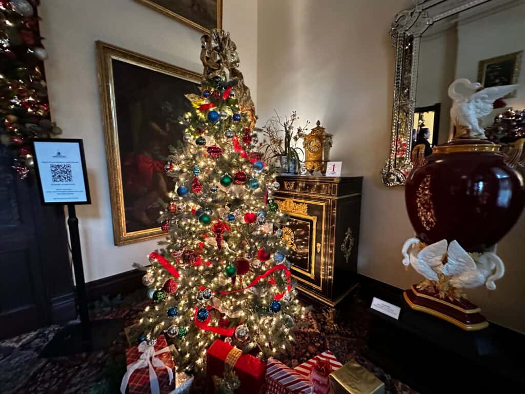 a christmas tree set up in a living room