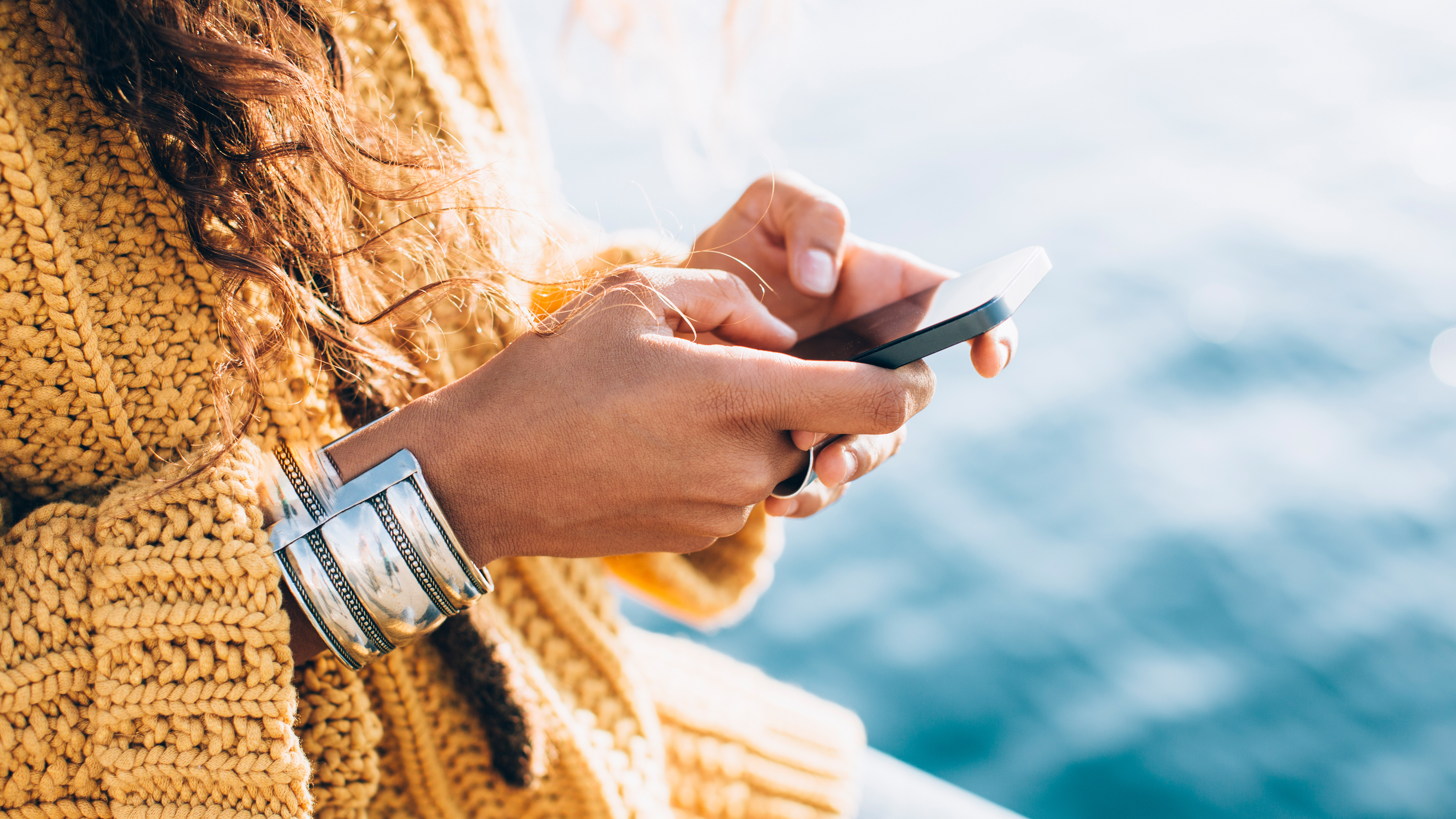 Woman texting on her mobile phone