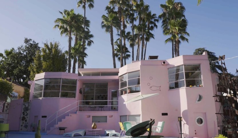 This house was originally built in the 30's, and given the retro pink treatment by owner Allee Willis in the '80s.