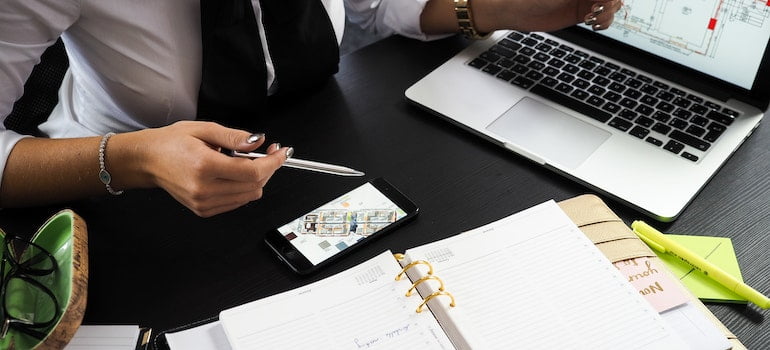 a woman checking commercial real estate metrics