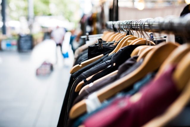 Clothes on hangers.