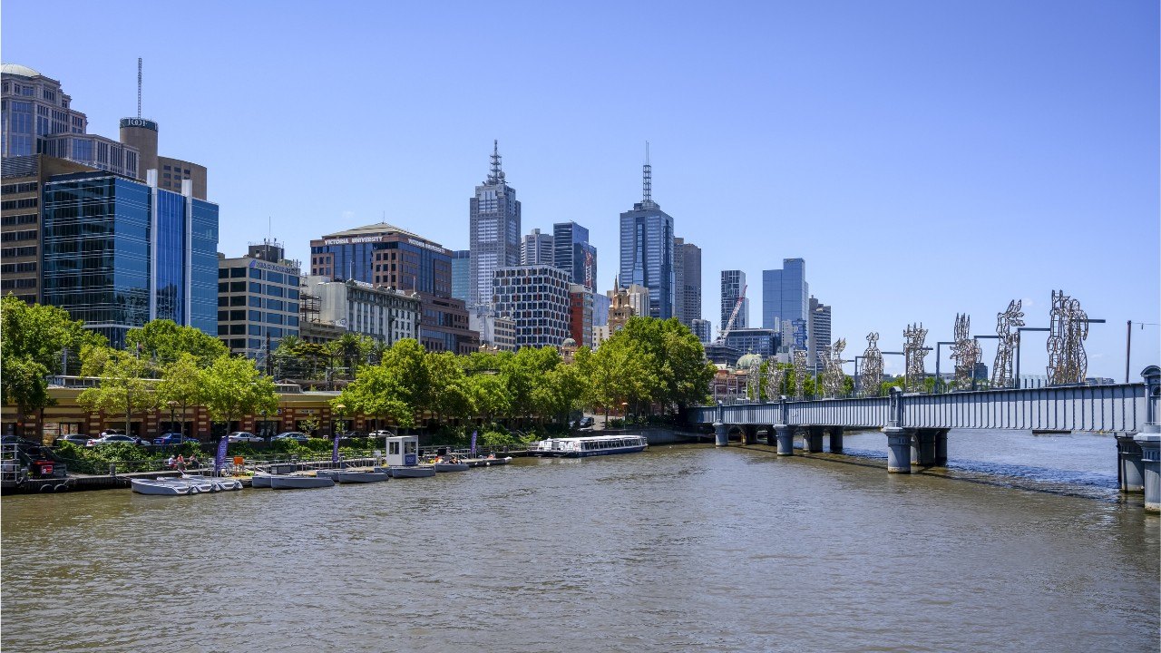 Skyline of buildings in Melbourne viewed from the waterfront and Sandridge bridge crossing the Yarra River. Melbourne, Victoria, Australia. (Photo by: Keith Levit/Design Pics Editorial/Universal Images Group via Getty Images)