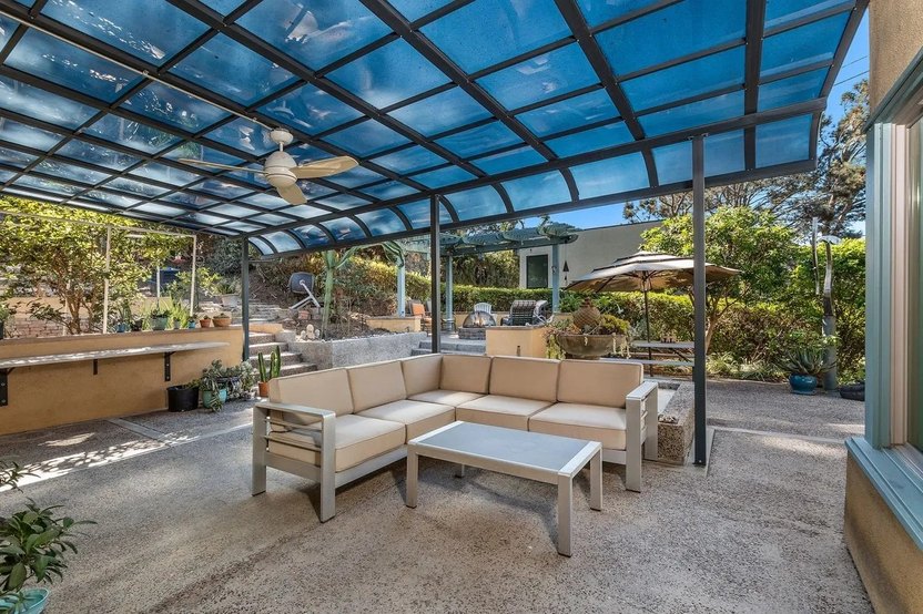 A large, covered terrace is ideal for al fresco dining.