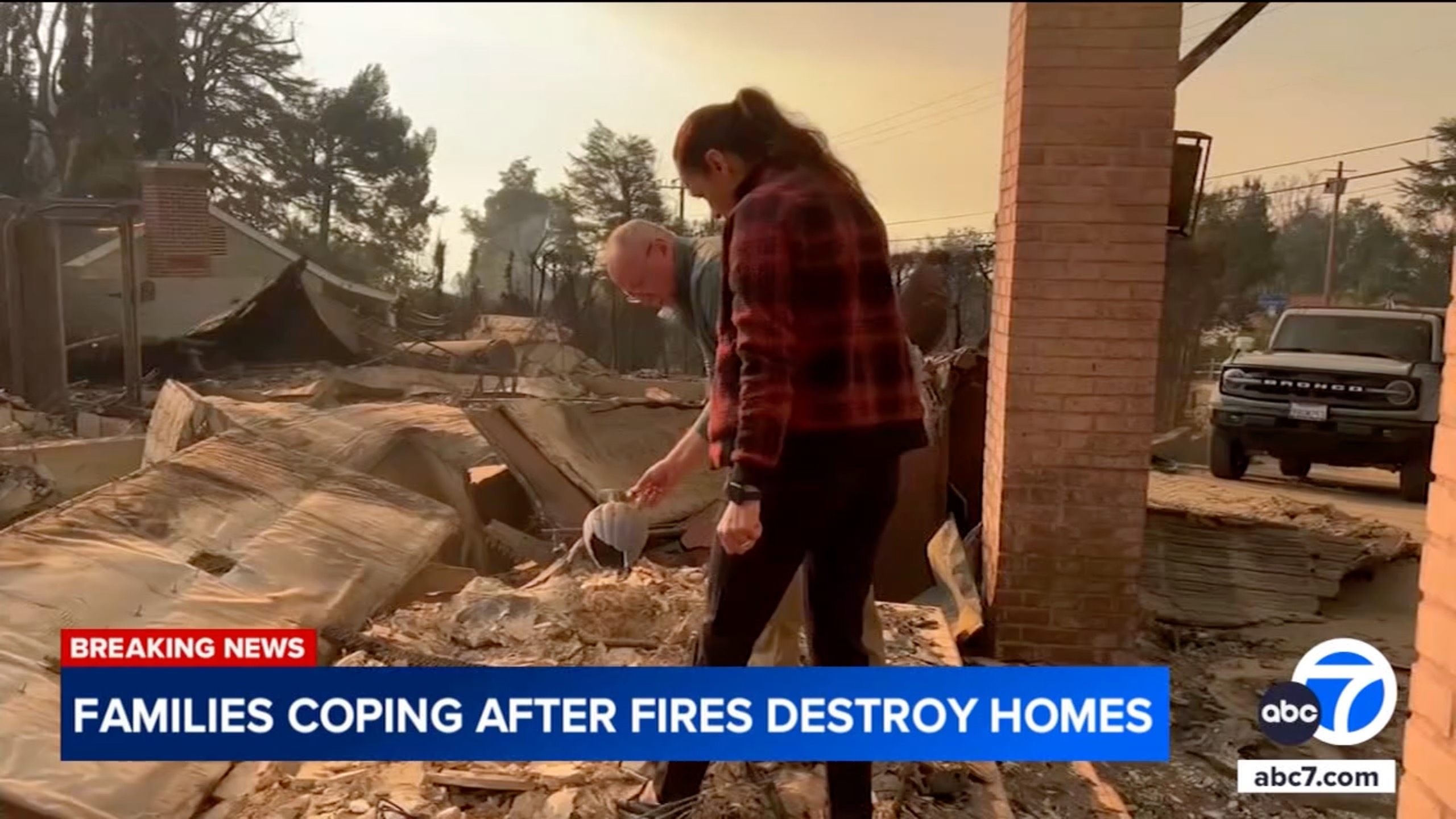 Yalda and Walter Seace sift through the rubble of their home destroyed by the Eaton fire in Altadena, Ca. on Jan. 9, 2025.