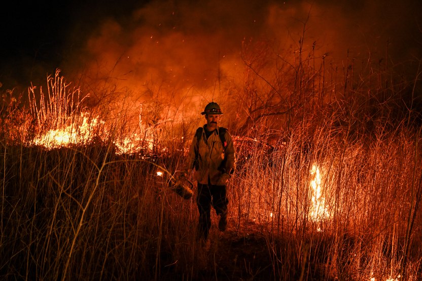 Crews are battling to brush fire near Auto Center Drive in Ventura, California