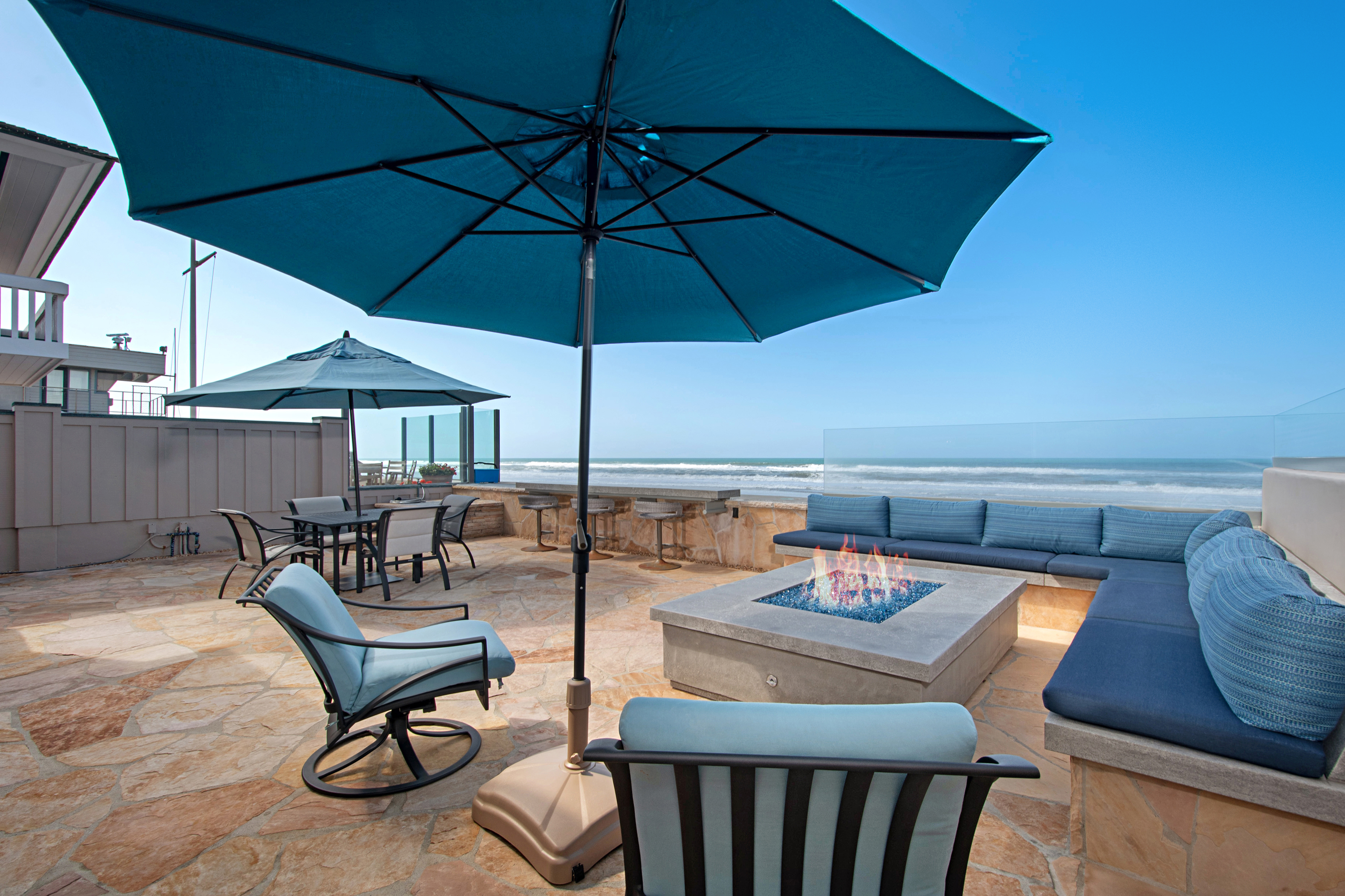 The beachfront home at 2016 Ocean Front has a deck...