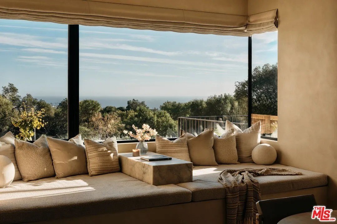 The main house features dazzling views of the ranch and the ocean beyond.