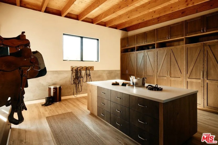 Even the tack room is meticulously designed.