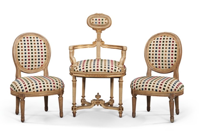 This whimsically designed seating is upholstered with "cut and voided polychrome velvet.