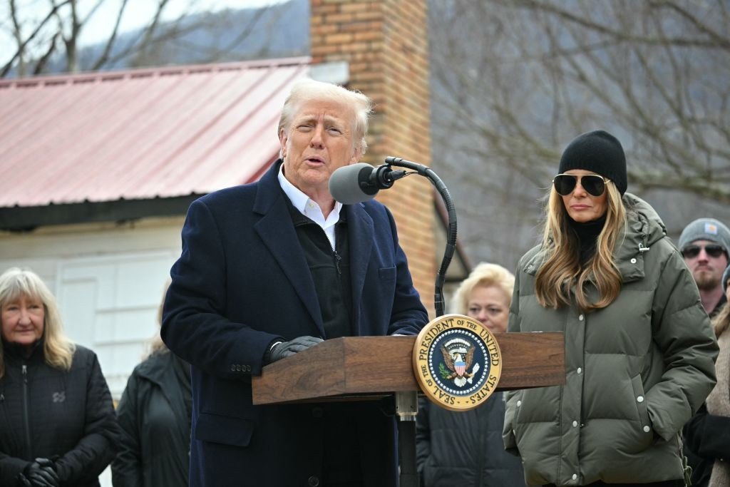 US President Donald Trump speaks while visiting a neighborhood affected by Hurricane Helene in Swannanoa, North Carolina