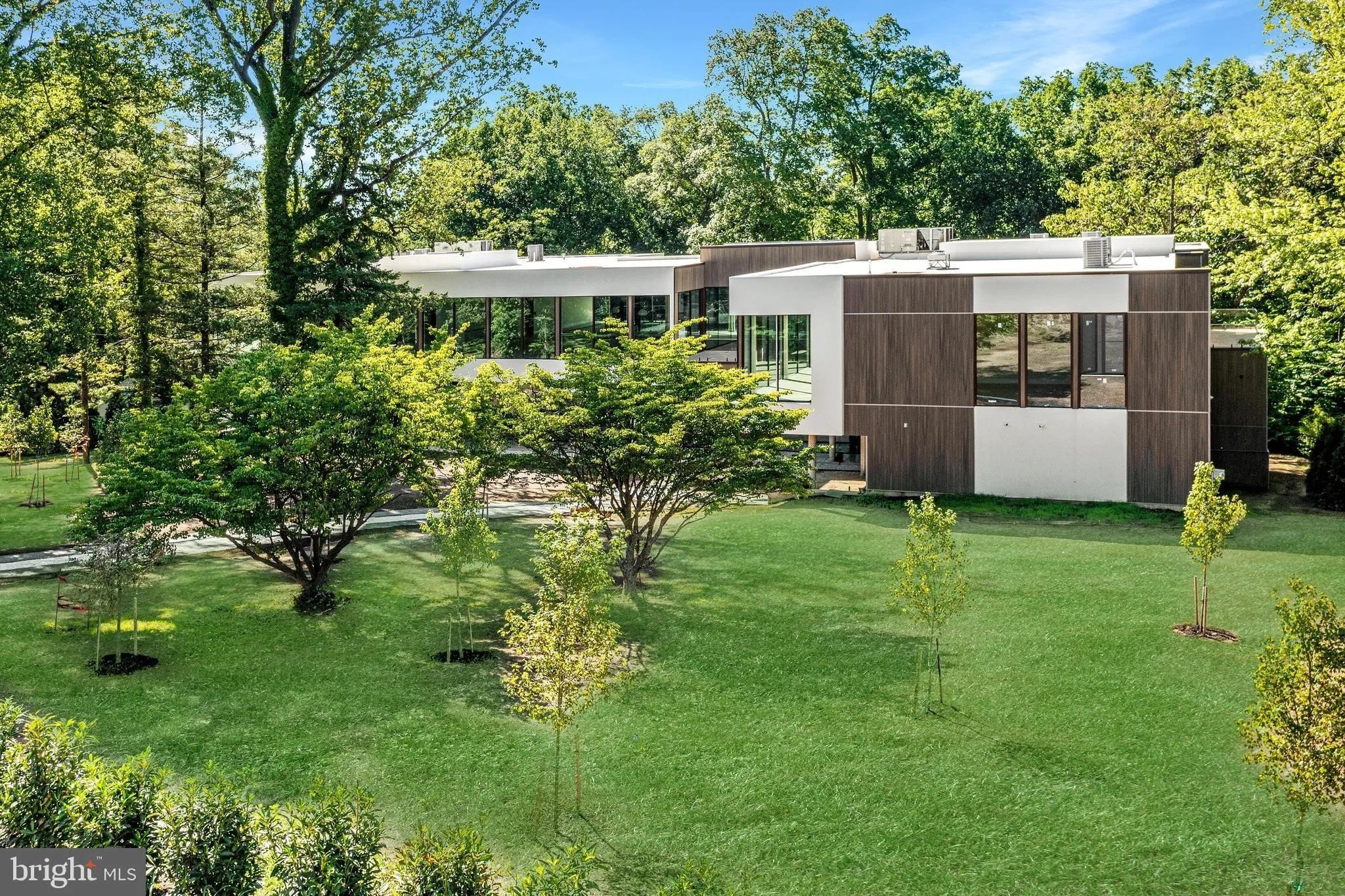 Constructed of glass, stone, wood and steel, this modern Philly mansion contains five bedrooms and seven baths.