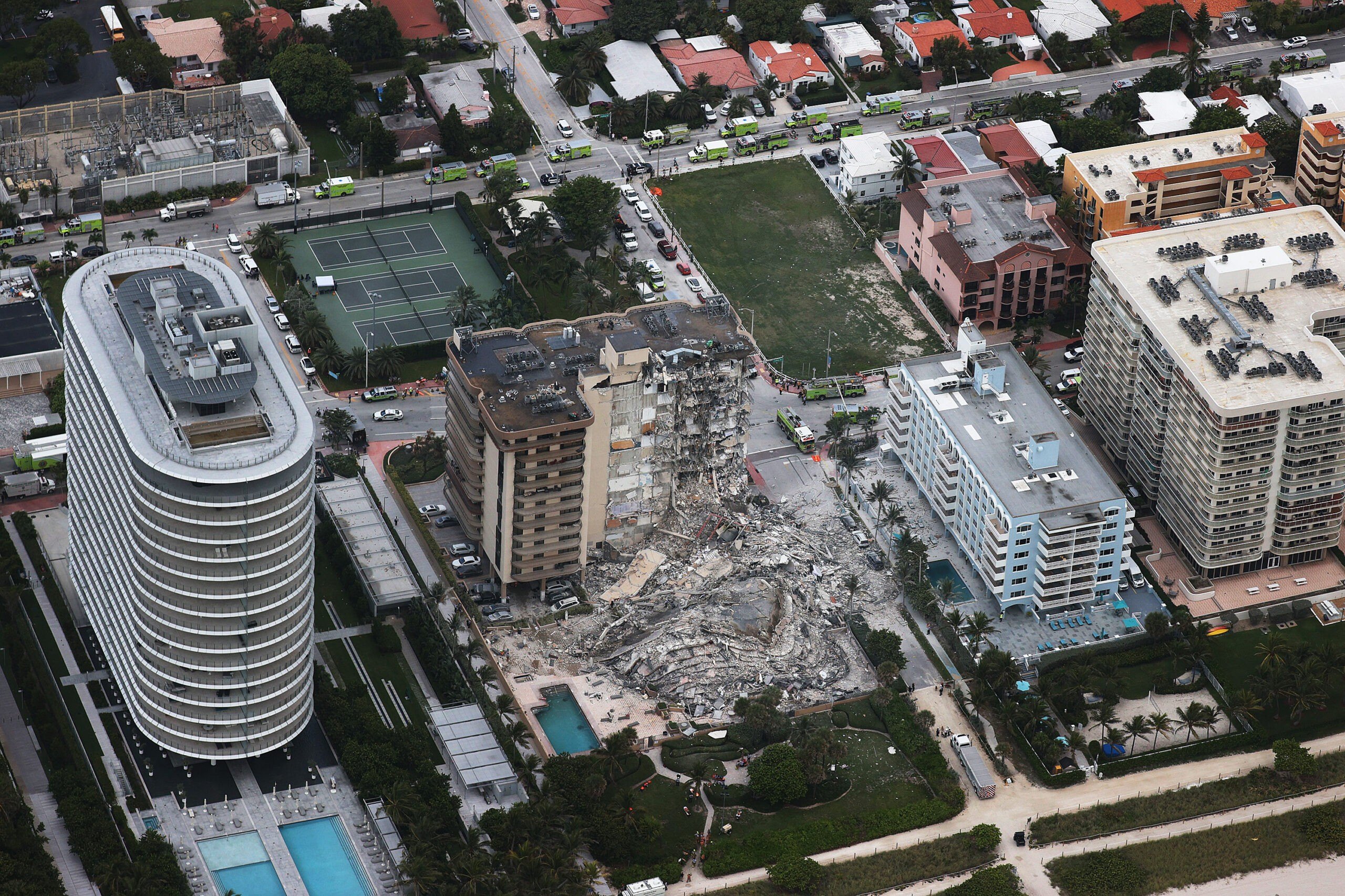 In this aerial view, search and rescue personnel work after the partial collapse of the 12-story Champlain Towers South condo building