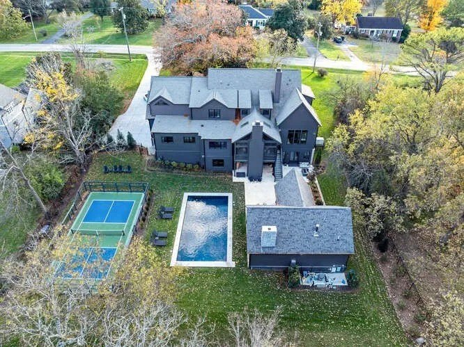 One of the nicest homes on the Nashville market right now is this modern farmhouse style mansion located on one leafy acre in the prestigious Oak Hill community. 