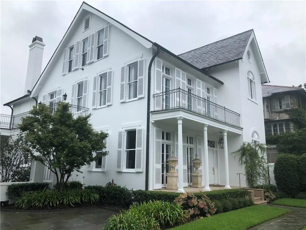 This four bedroom, 4.5 bath, 5,446 square foot Traditional features three-stories of luxuries, which include marble countertops, custom millwork and crown molding and gleaming wood floors.