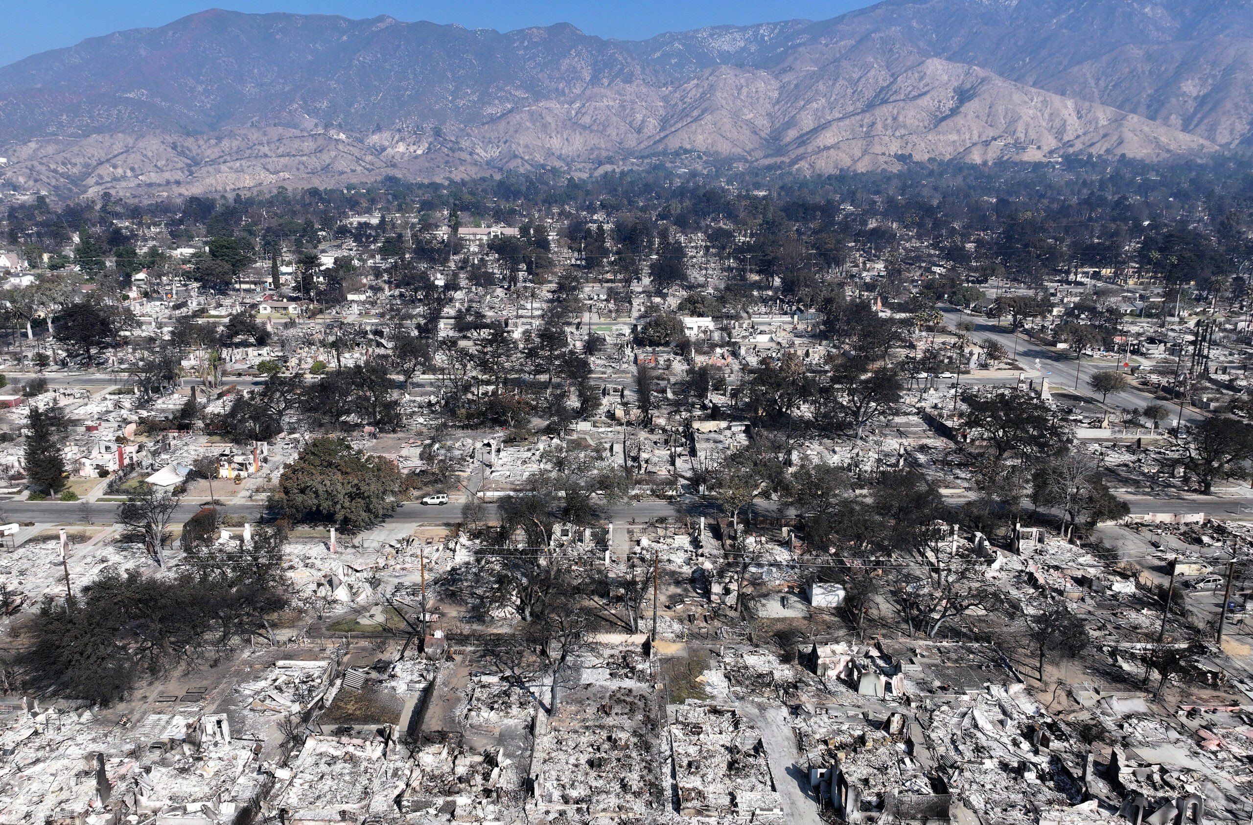 An aerial view of homes which burned in the Eaton Fire on January 19, 2025 in Altadena, California. Multiple wildfires which were fueled by intense Santa Ana Winds have burned across Los Angeles County