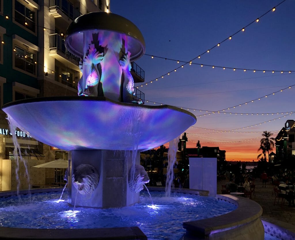 Purple lit up fountain at Piazza della Familia Little Italy San Diego