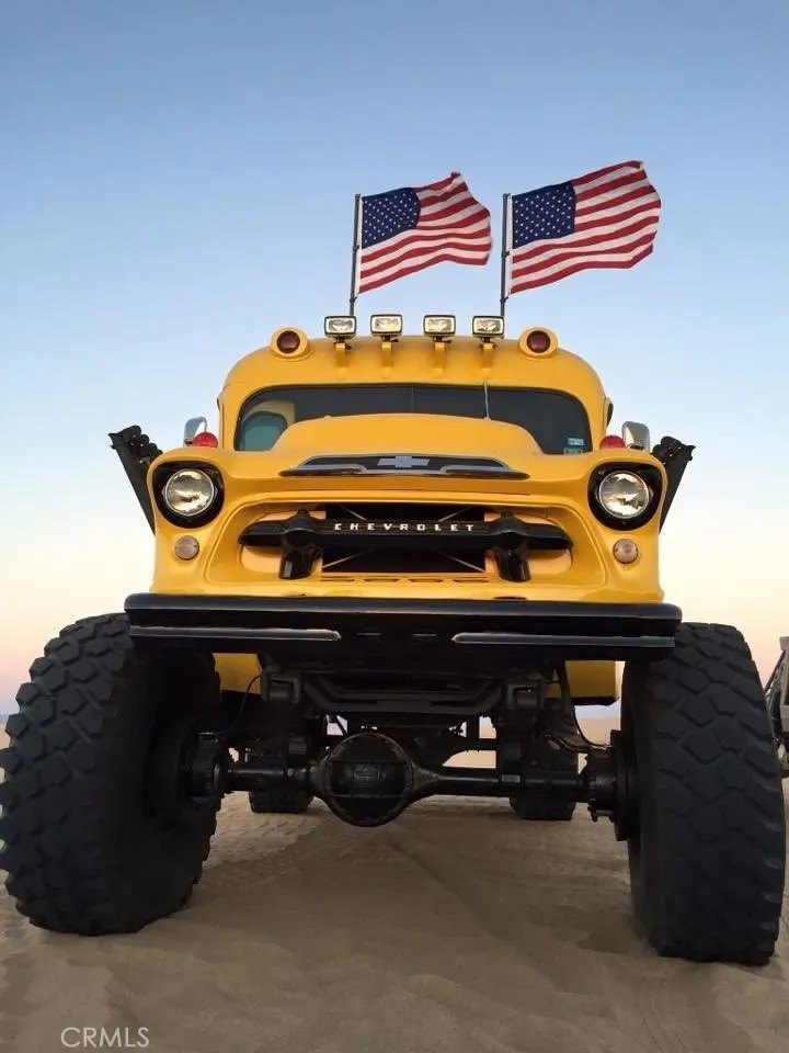 This customized 1950's school bus gets the whole class to and from the dunes and racetracks.
