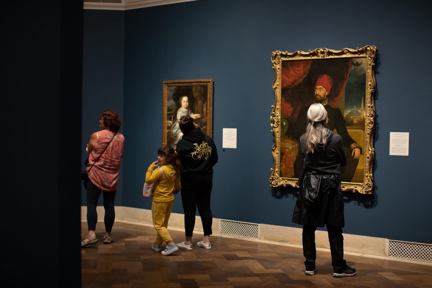 Interior of the San Diego Museum of Art featuring renaissance-era paintings