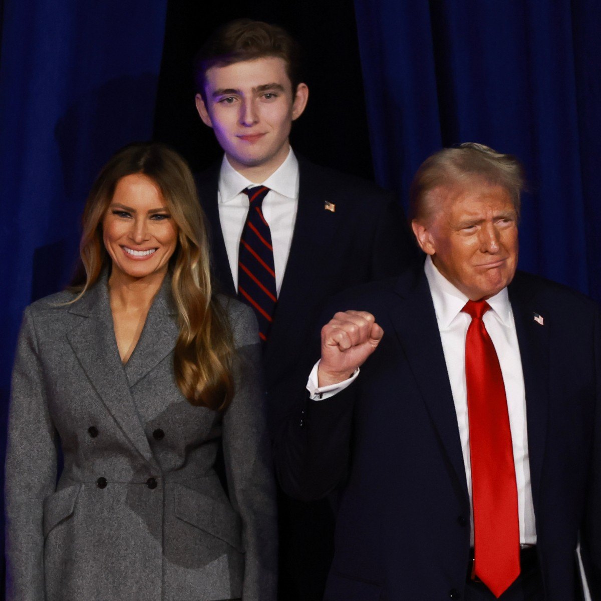 WEST PALM BEACH, FLORIDA - NOVEMBER 06: Republican presidential nominee, former U.S. President Donald Trump arrives to speak with former first lady Melania Trump and Barron Trump during an election night event at the Palm Beach Convention Center on November 06, 2024 in West Palm Beach, Florida. Americans cast their ballots today in the presidential race between Republican nominee former President Donald Trump and Vice President Kamala Harris, as well as multiple state elections that will determine the balance of power in Congress. (Photo by Joe Raedle/Getty Images)