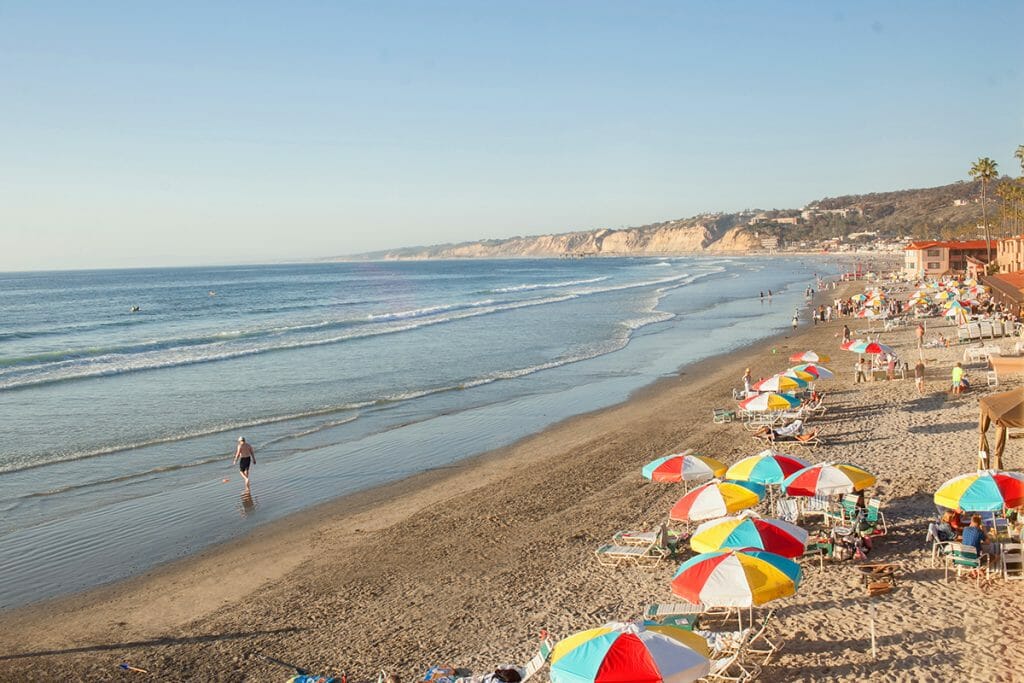 Beach with colorful beach umbrellas at the La Jolla Beach & Tennis Club