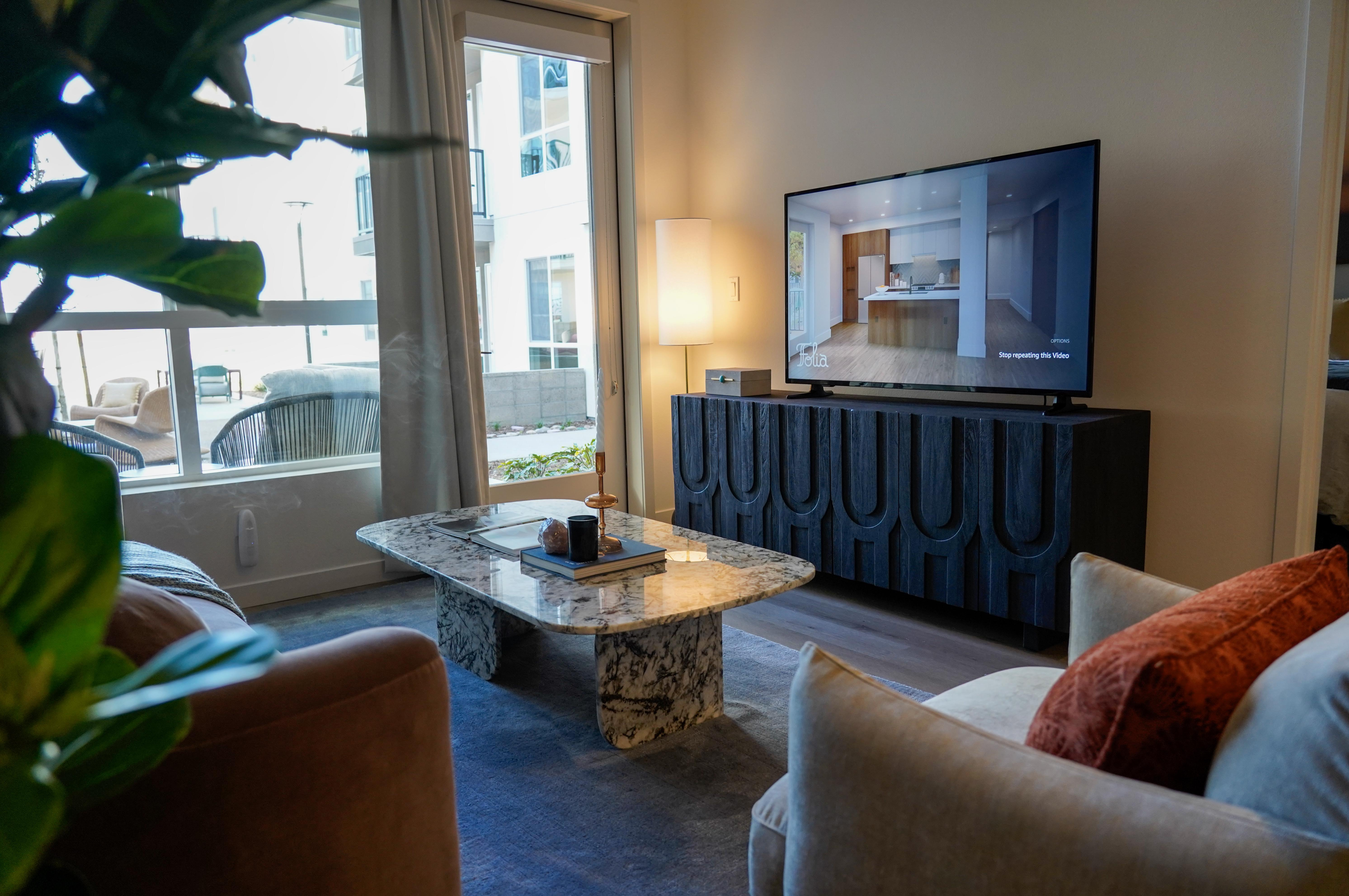 Living room in the model unit at the new Folia...