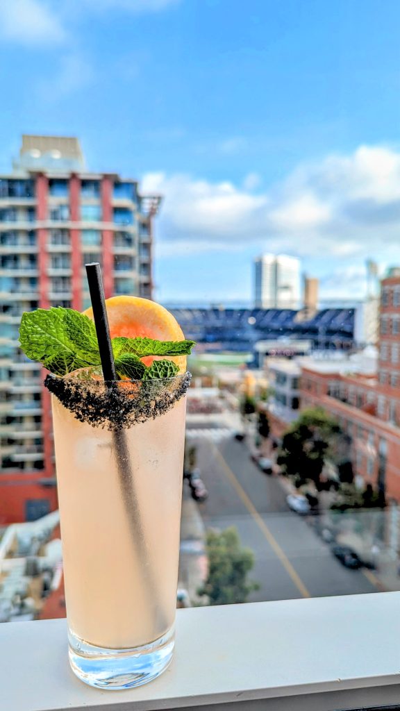 Cocktail at Rooftop bar at Borrego Rooftop & Kitchen overlooking San Diego gaslamp