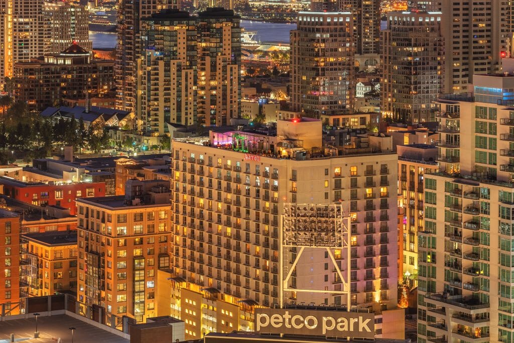 Aerial night shot of downtown San Diego with the Marriott Gaslamp in the center and Altitude Sky Lounge on the rooftop