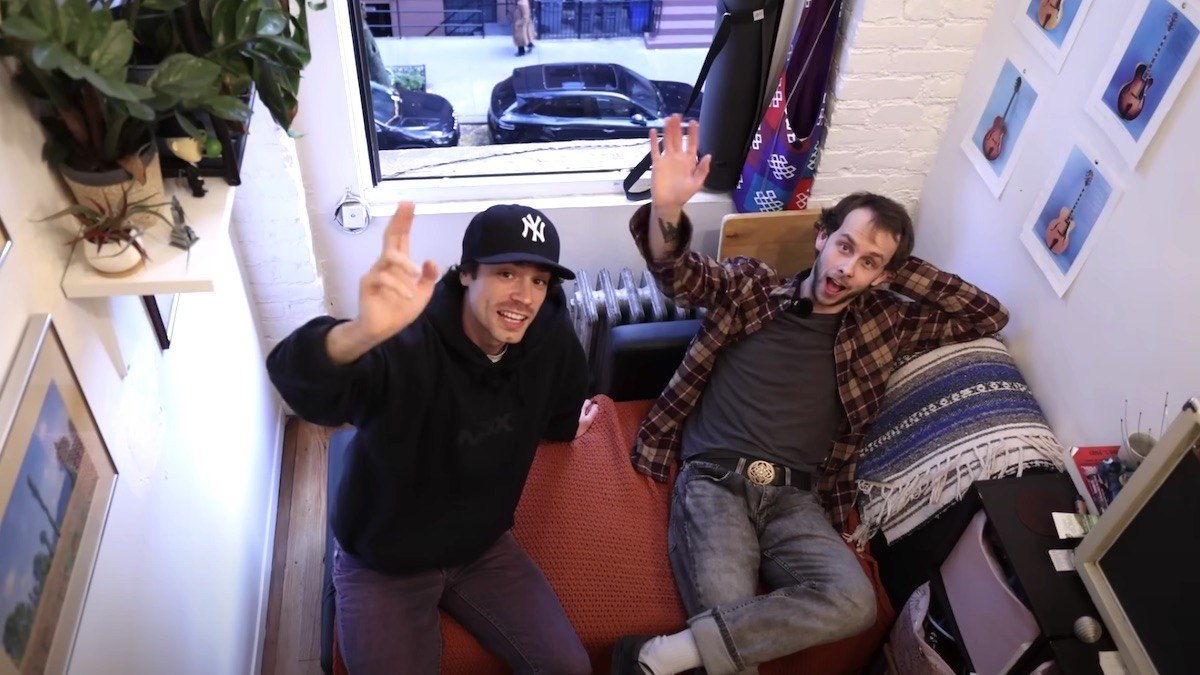 Caleb Simpson inside New York resident J.R.'s small apartment.