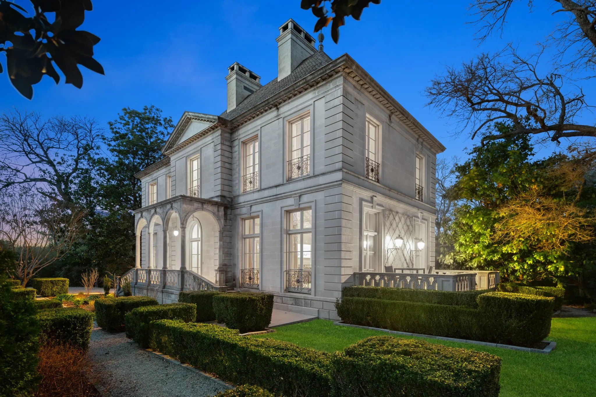 The grand guest house is made of the same limestone used on the main house.