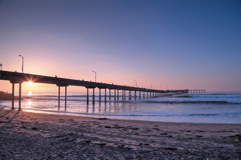 The sunset over the Ocean Beach Pier near San Diego, California.