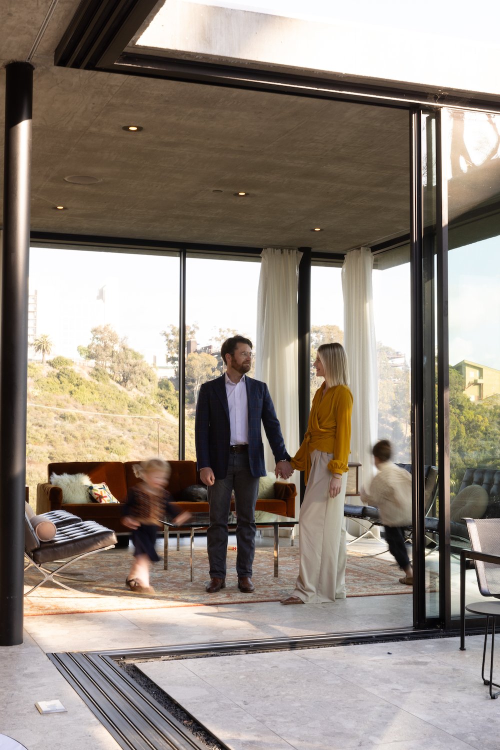 San Diego architect Matthew Segal and his wife April and kids inside their Mission Hills home
