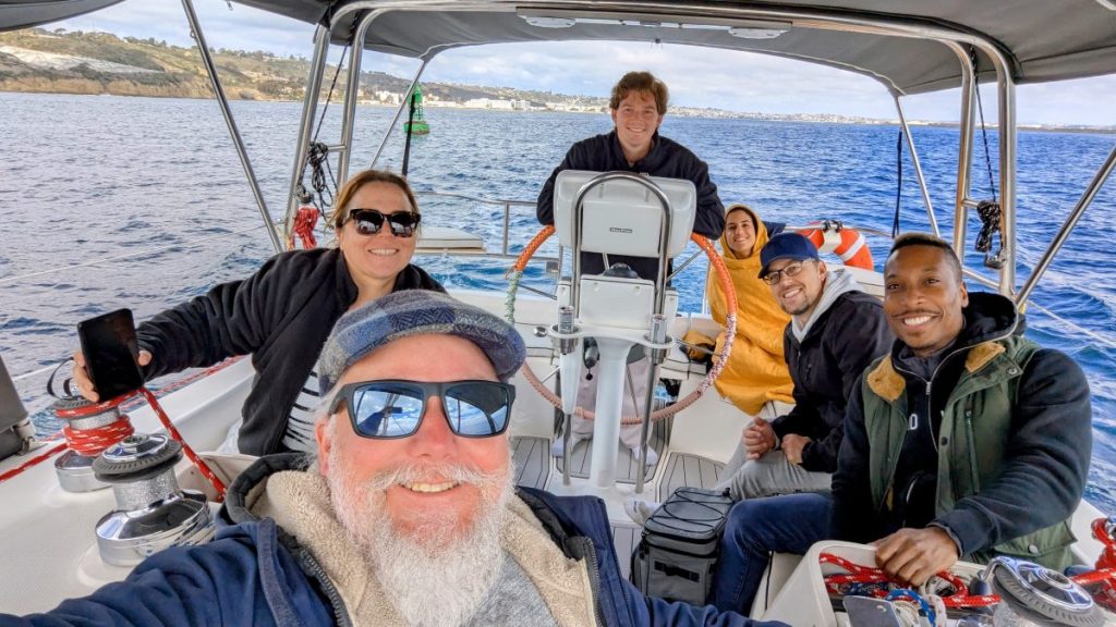 group of passengers on Sea Monkey sailboat in San Diego