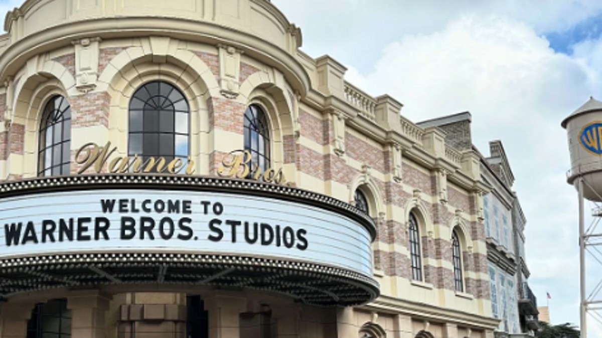 Entrance to Warner Bros. Studios with marquee and water tower in view.