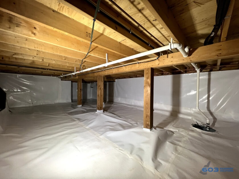 A fully encapsulated crawl space finished by 603 Basement Solutions. 