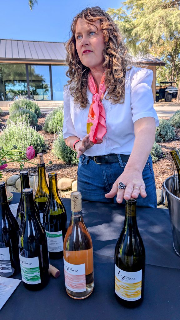 Woman Winemaker presenting her wine at Grand Tasting in Solvang