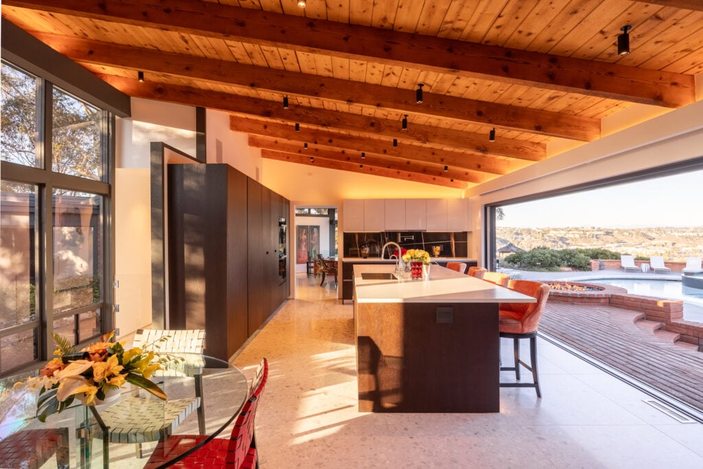 Interior of midcentury craftsman home in Mission Hills, San Diego renovated by architects Taal Safdie and Ricardo Rabines featuring the kitchen and living room