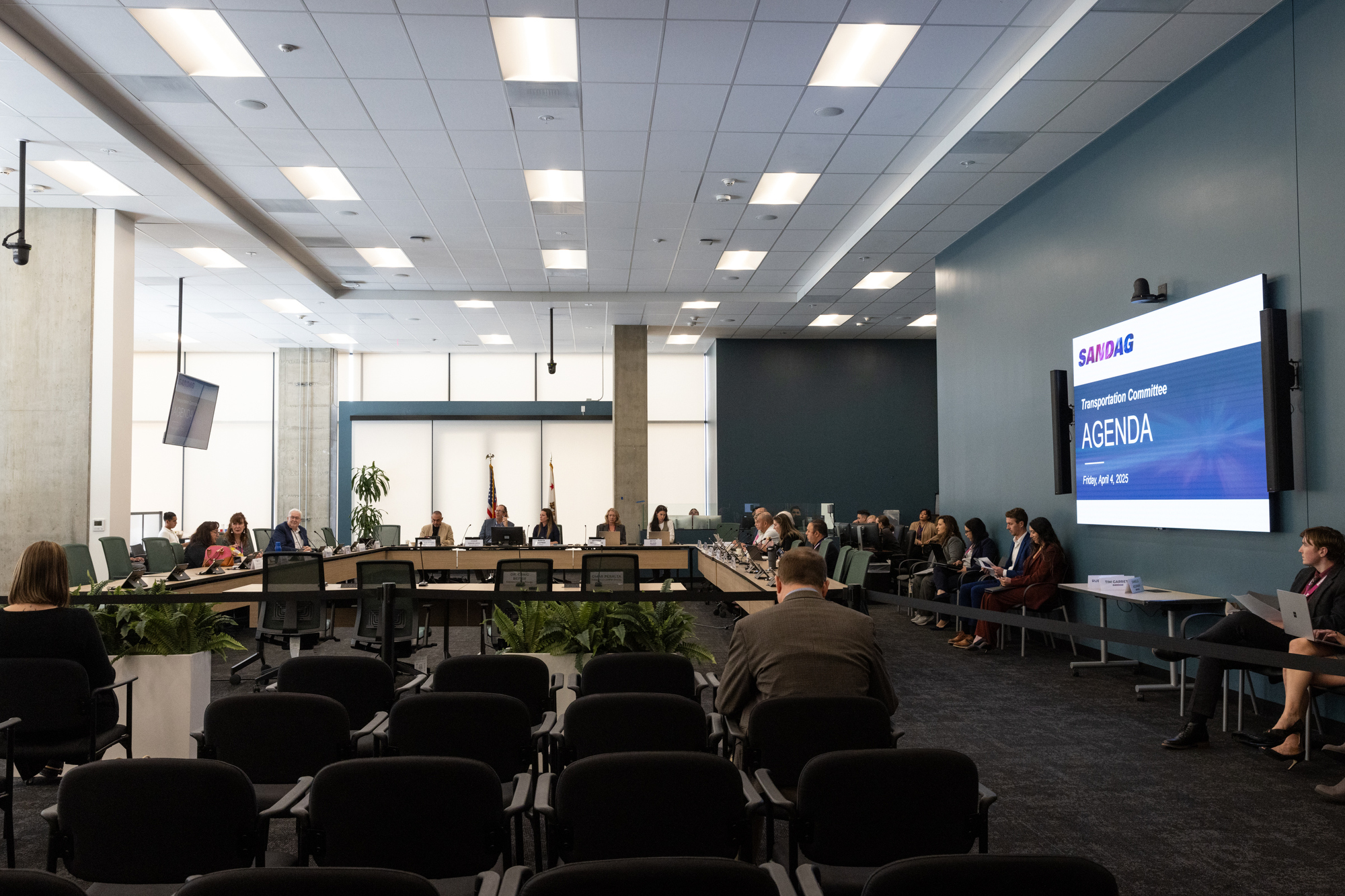 SANDAG's new board room at West, pictured during a Transportation Committee meeting on Friday, April 4, 2025. The agency leases 87,308 square feet of space spread across three floors in the mixed-use building. (Ana Ramirez / The San Diego Union-Tribune)