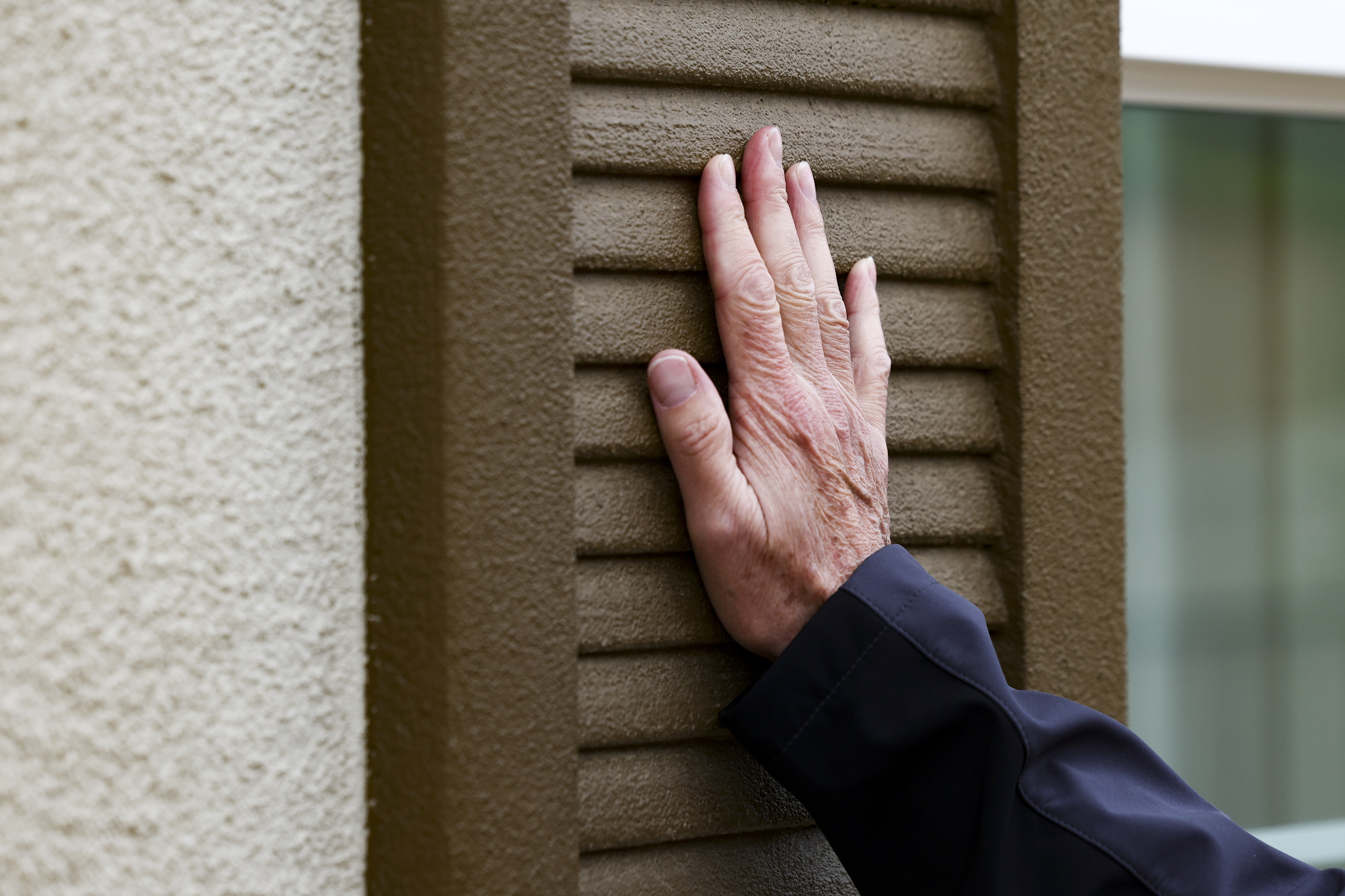 Steve Ruffner, president of KB Home Coastal shows a concrete...