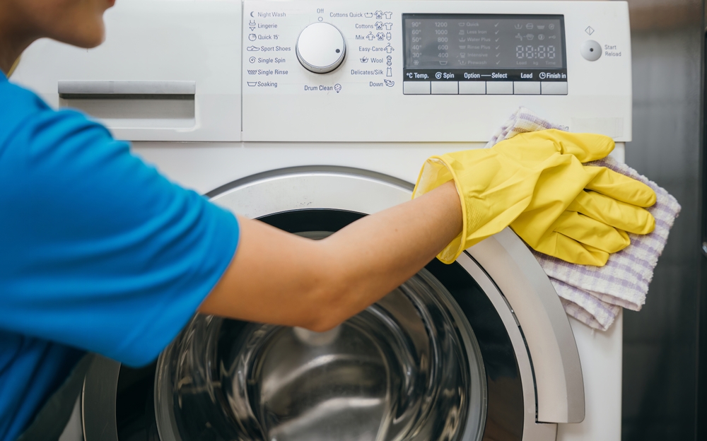 wiping down washing machine