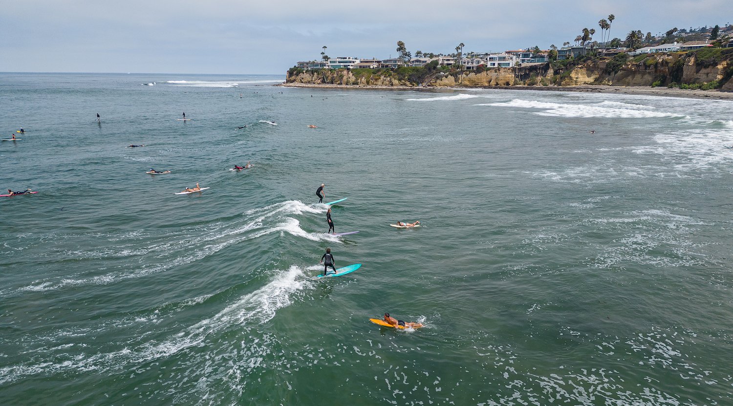 Fun things to do in San Diego on Father's Day 2025 featuring a surf session at Tourmaline Beach