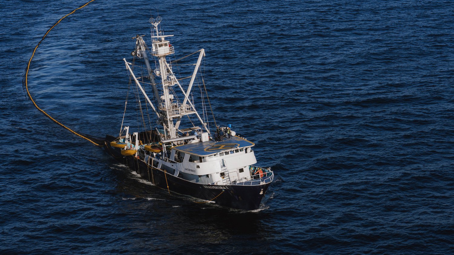 Fishing vessel working on the Baja Aqua Farms off of Ensenada