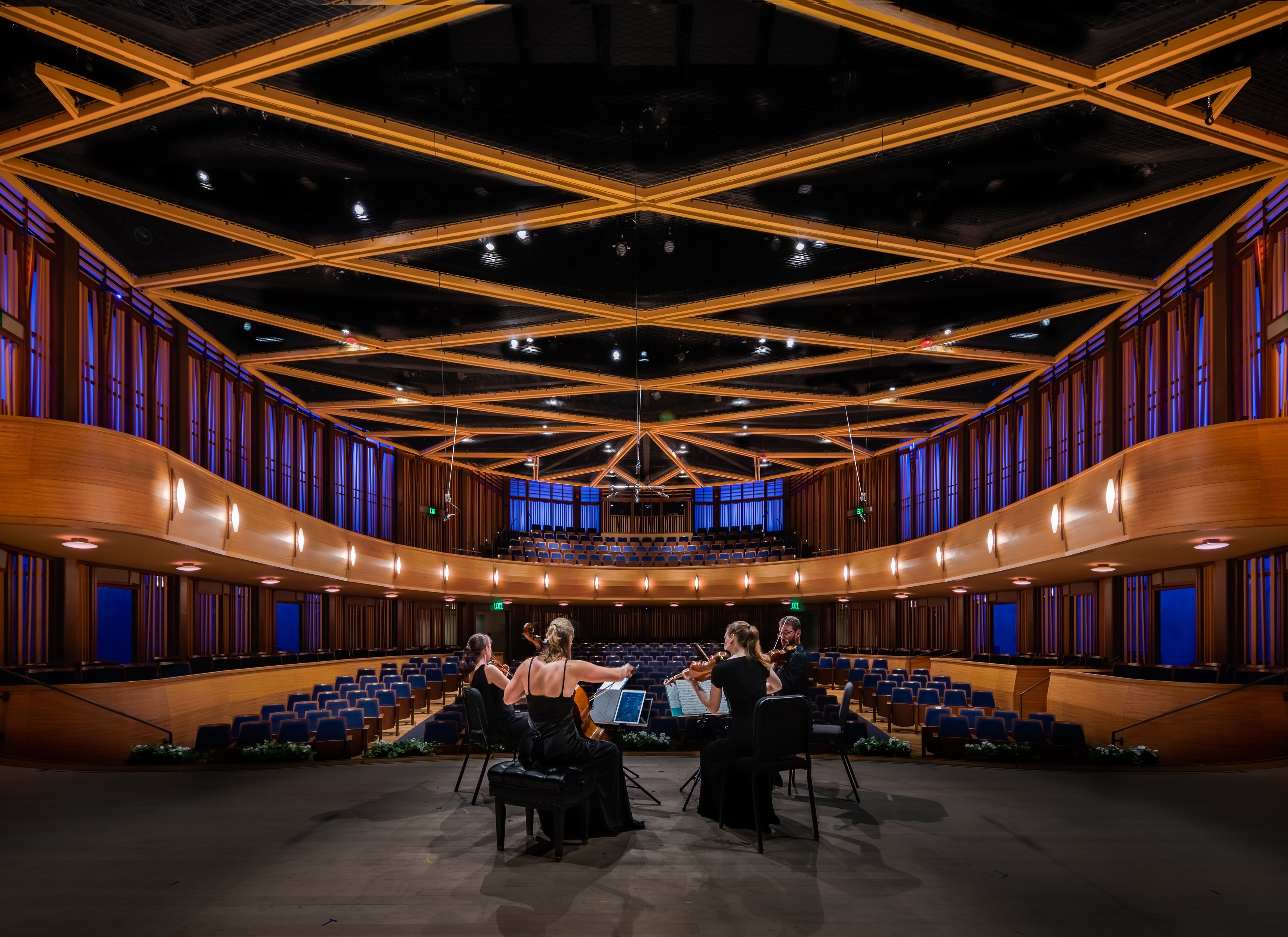 Musicians perform for the empty Baker-Baum Concert Hall at The Conrad