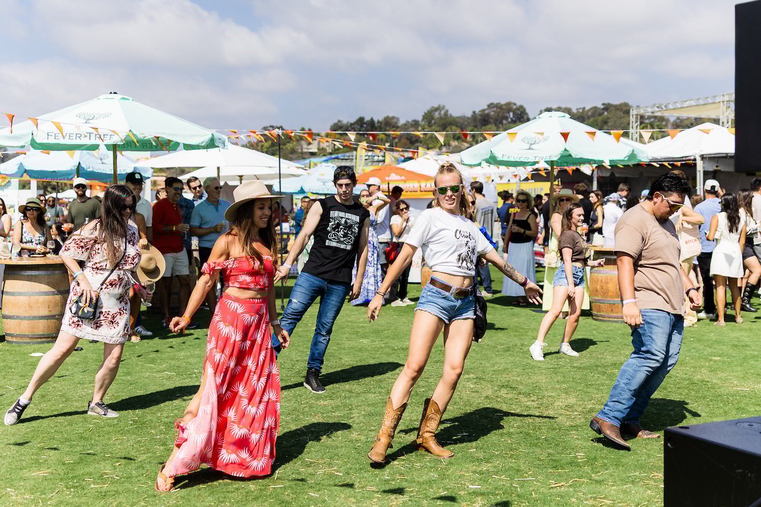 Line dancing at the 2025 Del Mar Wine + Food Festival Grand Tasting