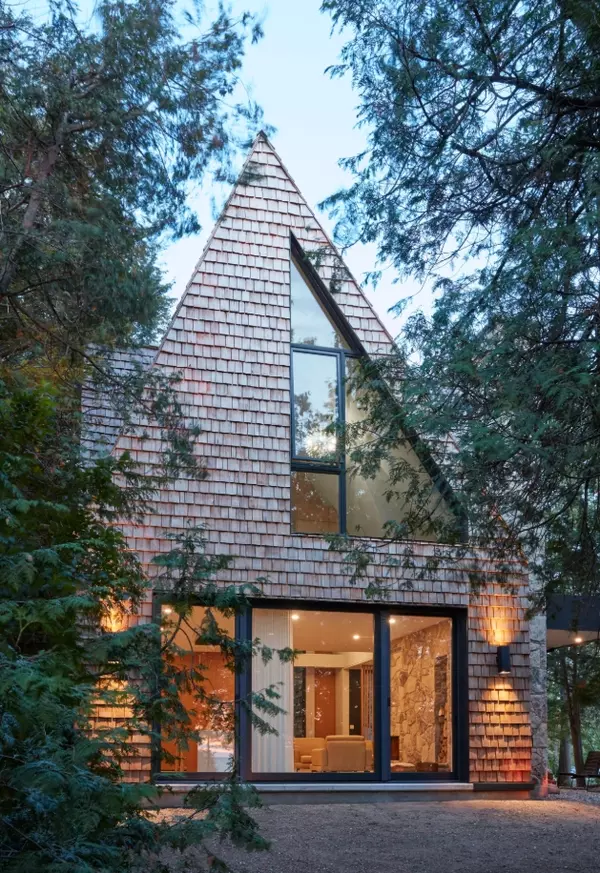 Huron-Kinloss Cottage: Defined by Its Pitched Wood Shingle Roof