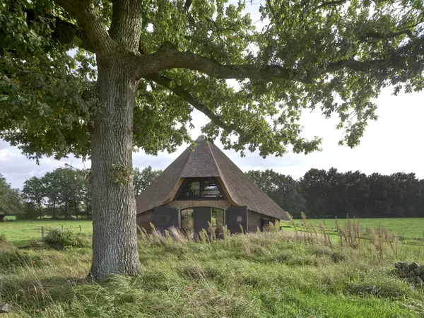 Restoring Heritage: A Brick Sheepfold with a Striking Hay Roof